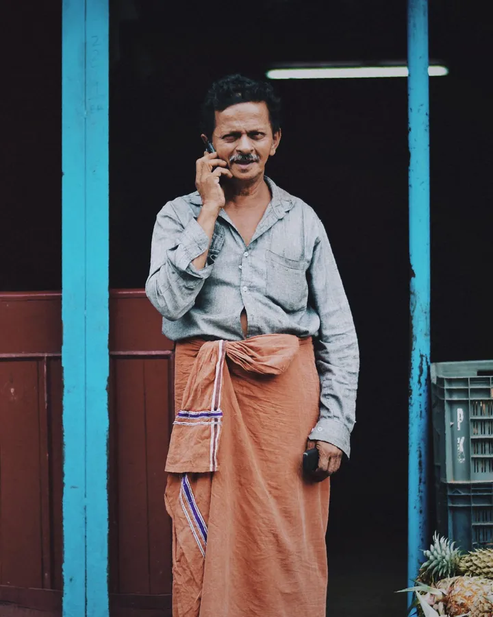 Contract worker in Tamil Nadu on a Tamil call about joining documents and background check consent